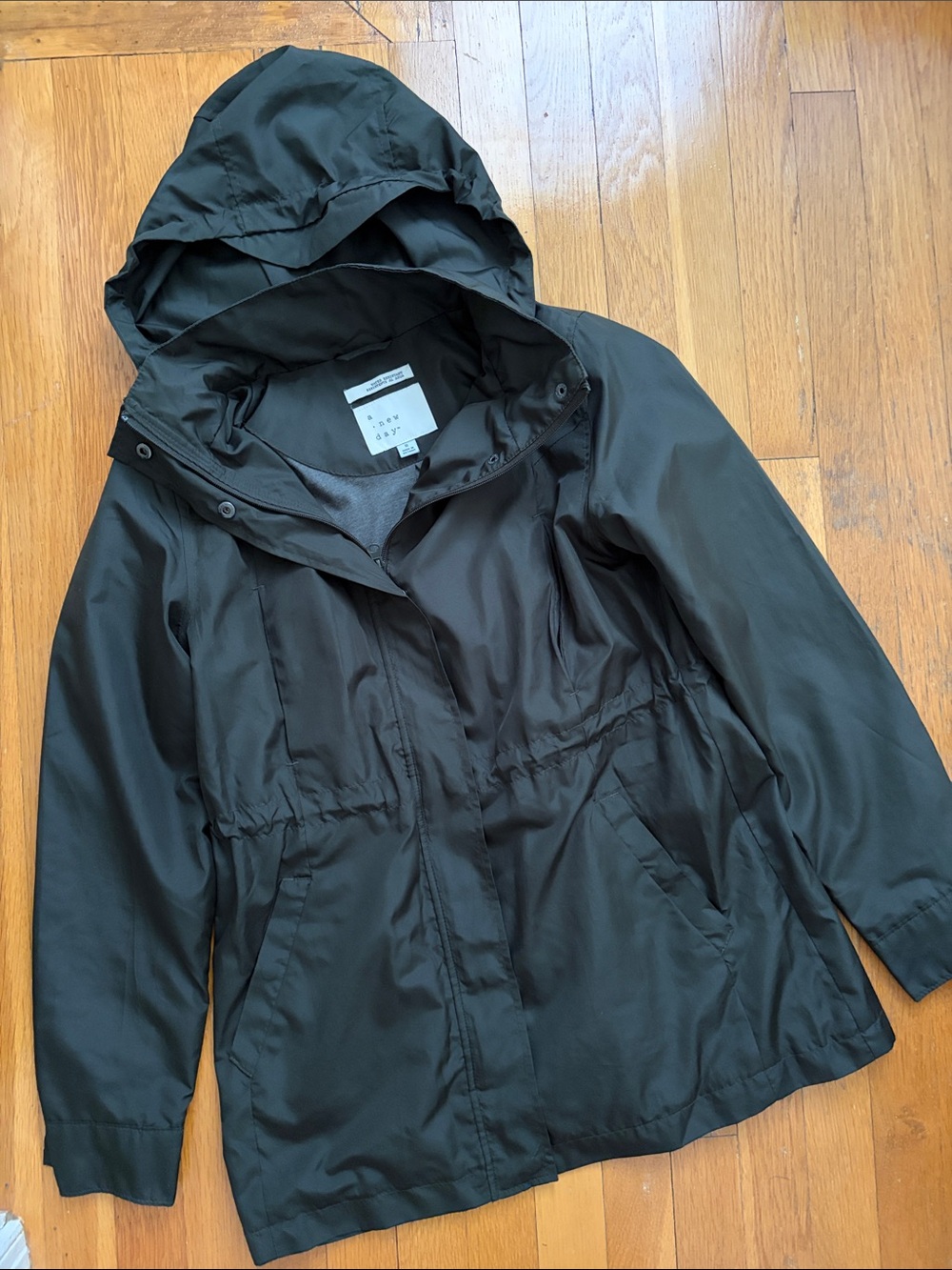 Water Resistant Collapsible Hooded Lined Rain Jacket in Black Size Small Women’s